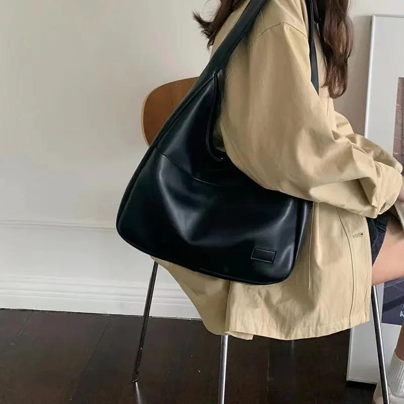 Bolso de mano de cuero negro de gran capacidad para mujer, bolso de hombro versátil de moda